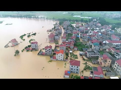 Typhoon Ewiniar floods villages, soaks cities in East and South China
