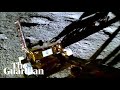 Shows indias lunar rover rolling onto moons surface