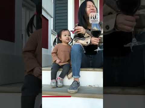 Cute toddler begs mom for chocolate