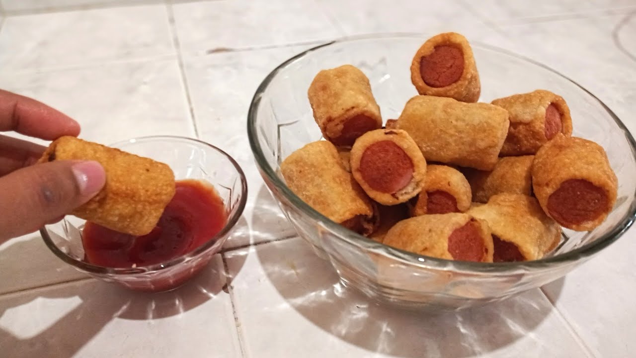 SALCHICHAS ENVUELTAS EN MASA, Pasabocas de salchichas.