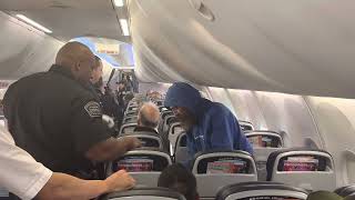 Unruly passenger removed from my plane after we were diverted back to LAX. Up close experience!!