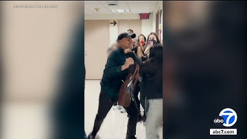 ICE officer seen pushing woman to the floor at NY immigration court relieved of duties, agency says