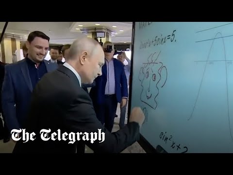 Putin draws bizarre smiley face on electric whiteboard in Moscow