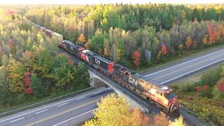 Nice Aerial 4K View! Extra Stack Train CN X121 w/Mixed Freight passing thru Berry Mills, NB
