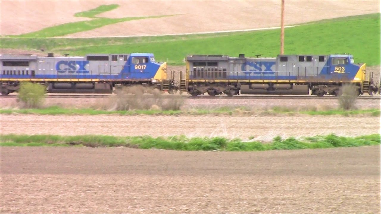 Two CSX units help pull short UP stacker near Marshalltown, Iowa - YouTube