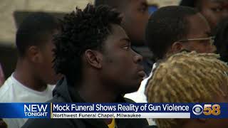 Milwaukee youth attend mock funeral