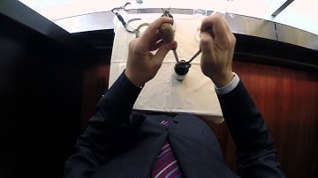 How to Open a Bottle of Wine with Tongs | Food & Wine