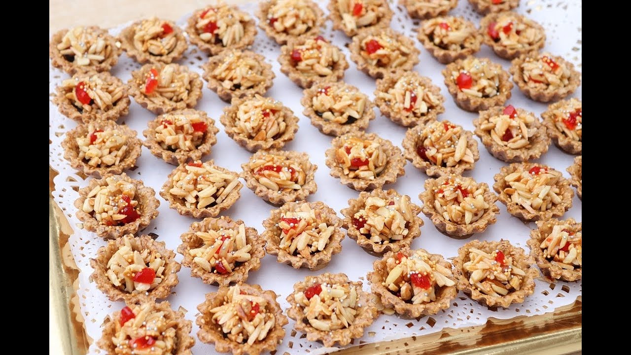 ها الجديد معسلة بزنجلان على شكل طويسات بحشوة تخليك تساليهم نهار الاول درمضان