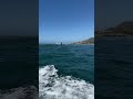 Tow in foil surfing off the Point in San Diego