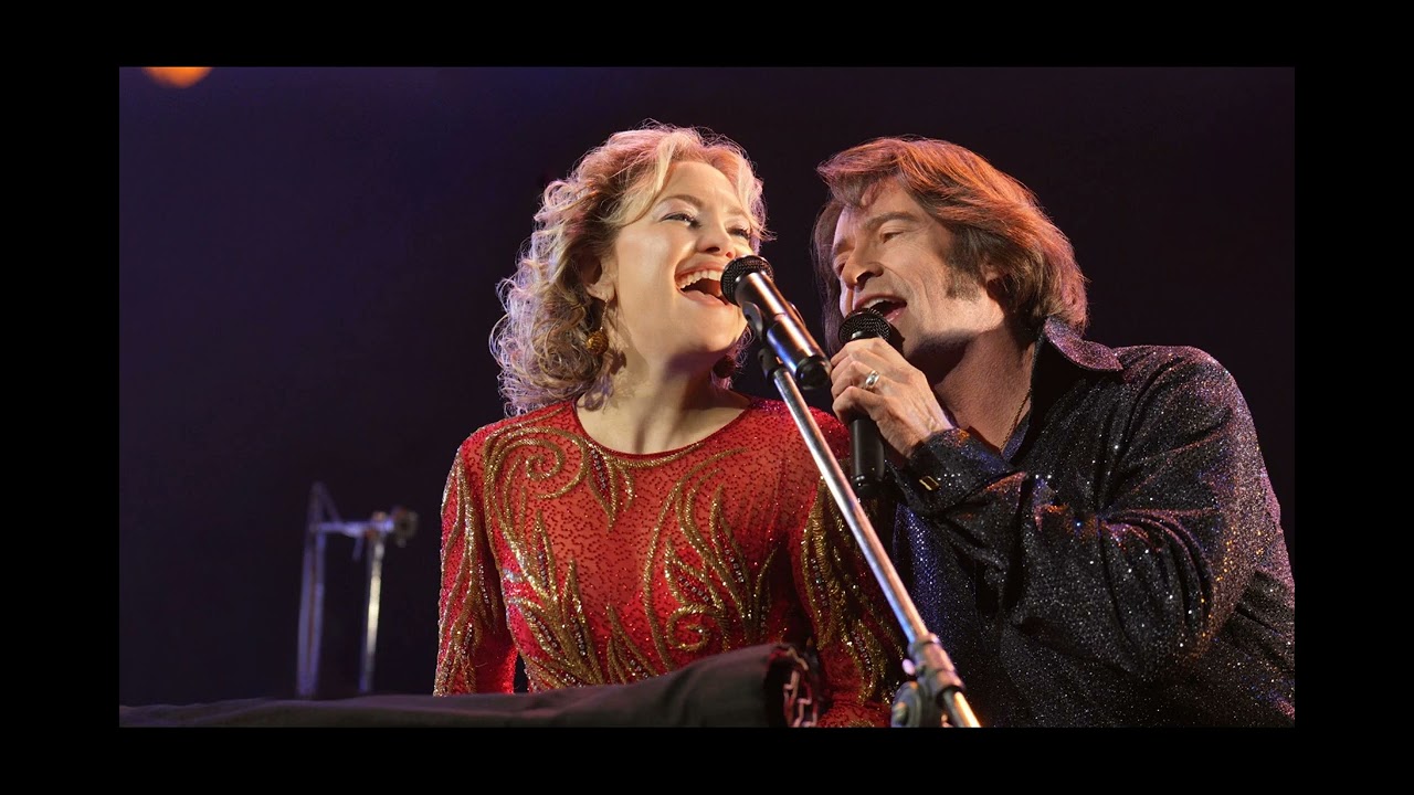 Hugh Jackman & Kate Hudson's Unlikely Harmony: The Magic Behind 'Song Sung Blue'