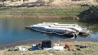 The salvage of nut house, houseboat that capsized on lake don pedro
during a poker run august 17, 2019. for complete stories, go to
https://sausalito...