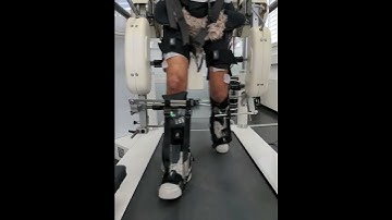 Spinal stimulation triggers leg muscles to walk in sync with a rehabilitation robotics exoskeleton