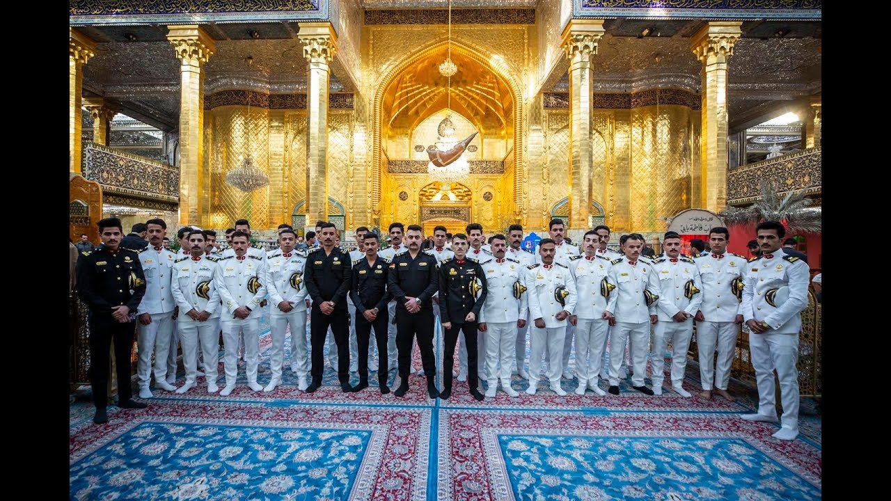 كوكبة من خريجي الكلية البحرية يؤدون قسم تخرجهم عند مرقد أبي الفضل العباس ( عليه السلام )