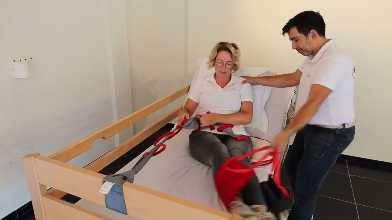 Sitting up, turning, and standing up from bed with manual transfer aids.