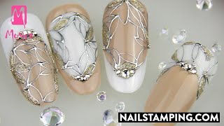 Hand-painted nail art with stained glass effect (nailstamping.com)