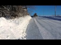 Cat 140M Plowing Snow