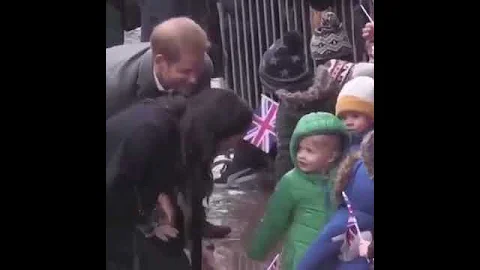 Meghan Markle raps young girl on back to try to get her photo-op with kid