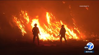 Firefighters battle 2 wind-fueled fires in Riverside County