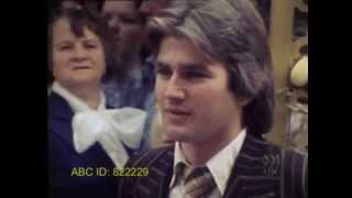 This Day Tonight: Kissing Booth (1976)
In what was either a grand social experiment or a very slow news day in the Perth ‘This Day Tonight’ office back in 1976, ABC reporter John Barton installed a kissing booth in the Hay Street Mall and he and his friend offered free kisses for spring, with varying results.
ABC ID: 822229 This Day Tonight: Kissing Booth (1976)