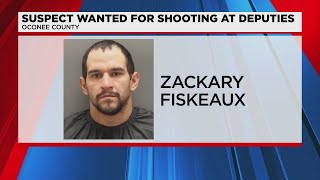 Suspect wanted for shooting deputies