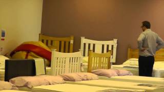 Nicola Visits A Bed Store In A Sumo-Suit