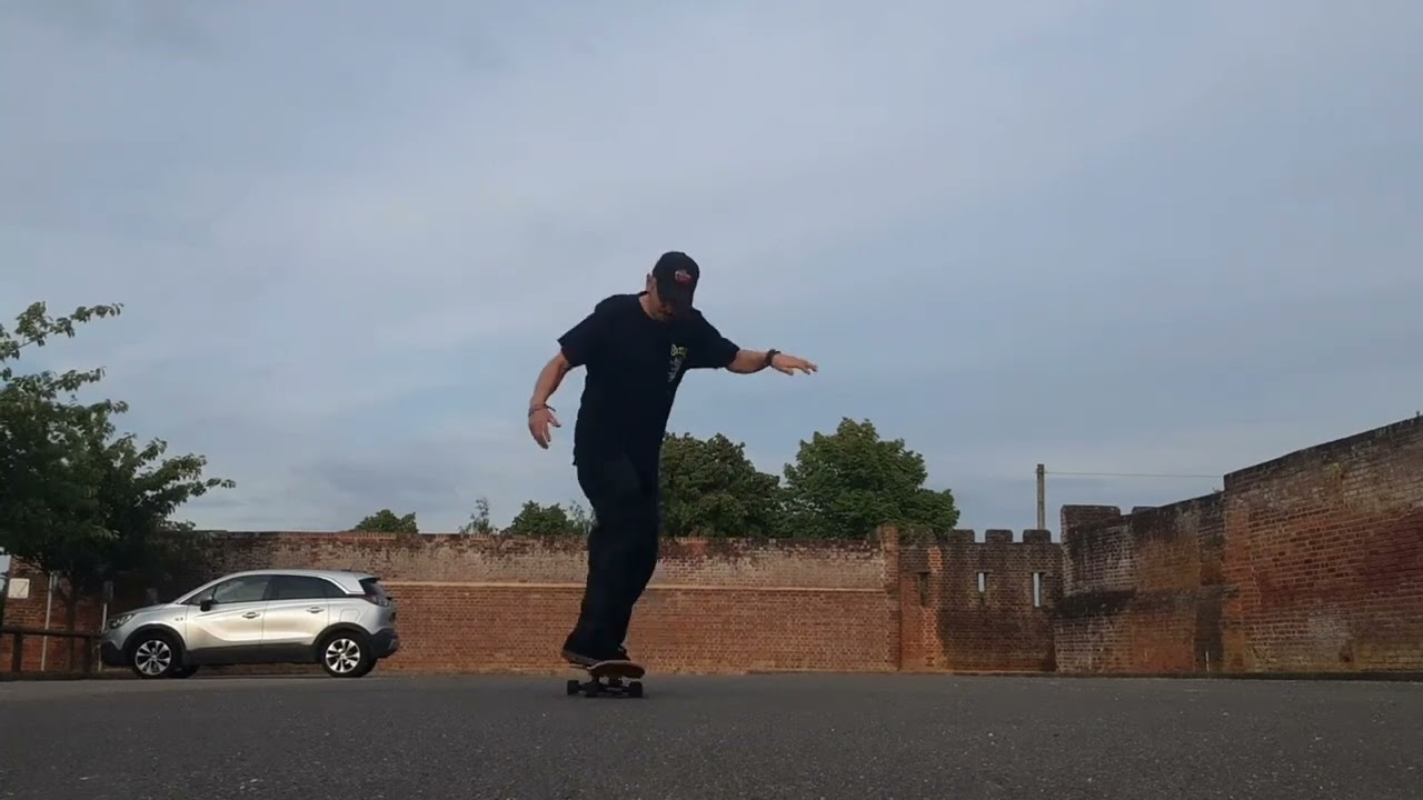 Trying to get creative with old school skateboarding in the car park