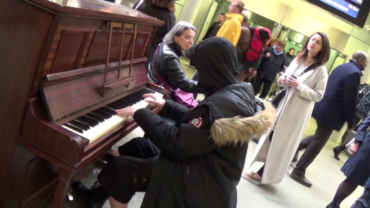 Hoodie on Piano Captivates Mystery Girl