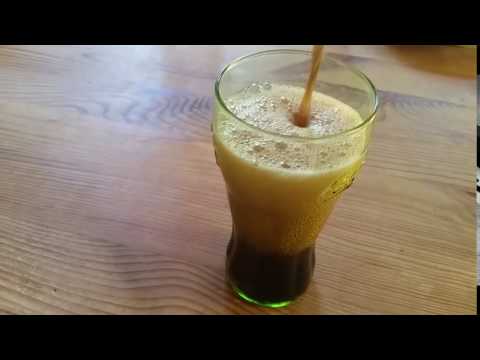 pouring Coca-Cola into a glass