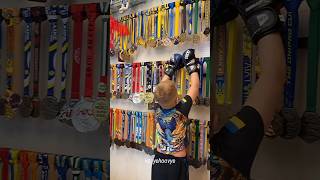 evanni kuda vella father medals?