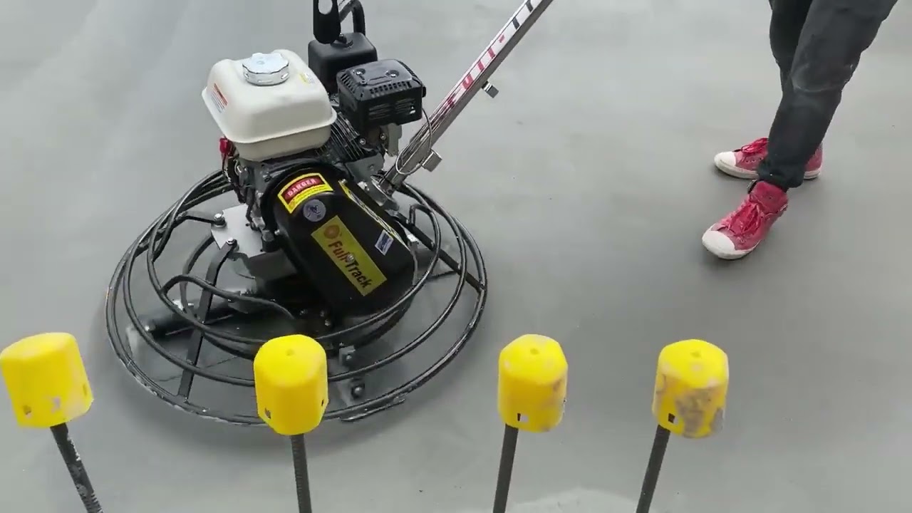 32 inch Full-Track Power Trowel in Melbourne, doing for what it's designed for.