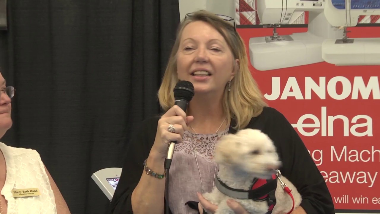 Mary Wins Janome Sewing Machine at AQS QuiltWeek in Virginia