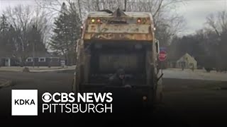 Wild video shows Ohio police suspect climb out of trash can, startling sanitation worker Profile