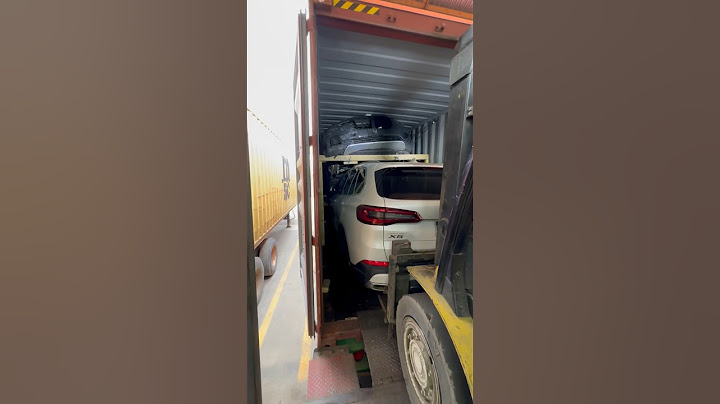 3 vehicles load into a 40” container