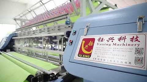 Computerized multineedle shuttle quilting machine for garments