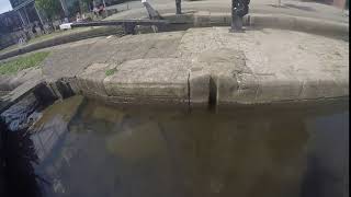 Standing precision jump over canal