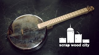 DIY 2 string musical instrument, from an oven pan ( panjo )