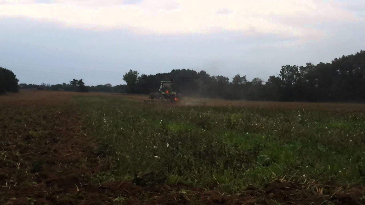 Deere 8630 with 24' oliver disk