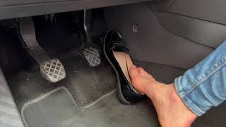 Girlfriend pedal pumping ASMR gaspedal in patent black flat loafers