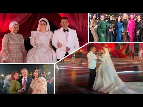 فرحة الام زفاف ابنة هبة قطب الميكاب ارتيست دينا هشام وفستان العروسة يتصدر التريند بحضور نجوم الاعلام
