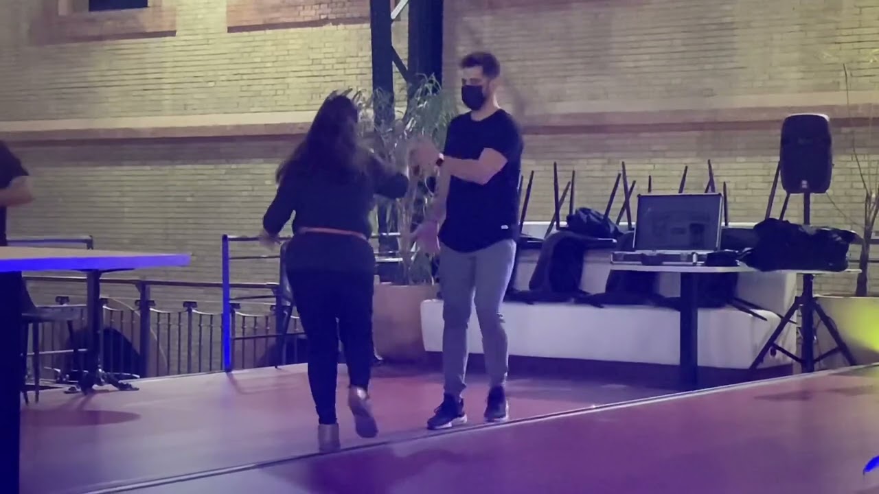 Delia dancing with instructor Bobby Reyes del Mambo of Seville, Spain