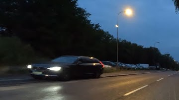 A Car Partly Stopped On The Cycle Path