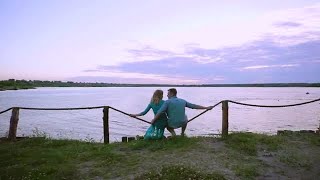 Couple Sitting On A Rope Stock Video