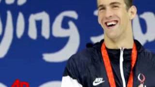 Phelps Wins Gold, Sets Record: 1 Down, 7 to Go