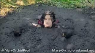 Girl sinks in quicksand mud - pink sink