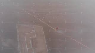 Slackline world record in Moscow, Guinness world record. A man balances on tight rope, a view of the
