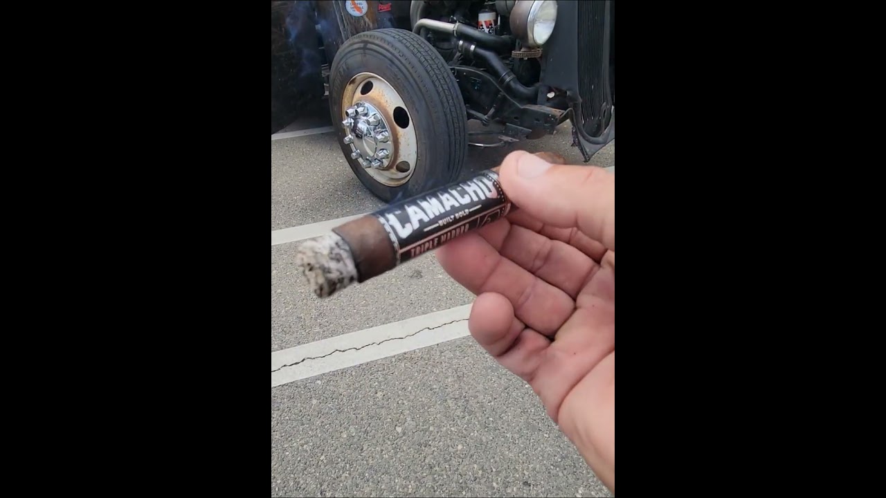Camacho Triple Maduro cigar and a 1935 Dodge ratrod. 