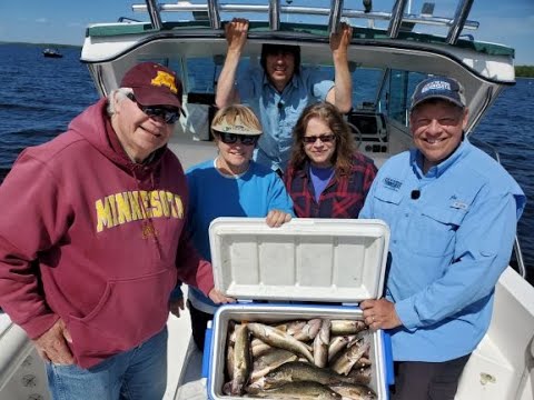 Family Fishing On A Lake Of The Woods Charter Boat