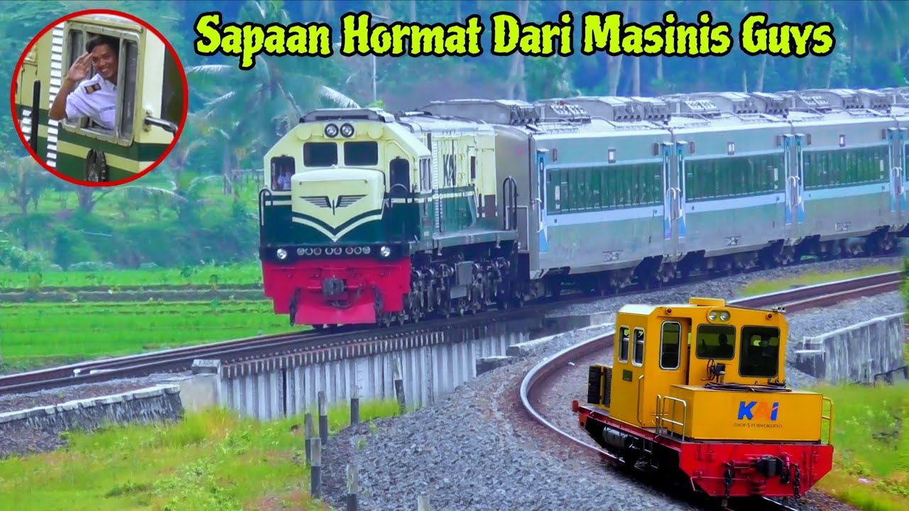 KERETA API PENDEK LORY MIRIP MOBIL SEDAN WARNA KUNING MERAH MELINTAS DI JALUR KERETA API