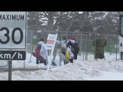 covid-19:-canadian-evacuees-arrive-at-quarantine-centre