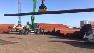 Sennebogen 840E Handling Pipe at Netherlands